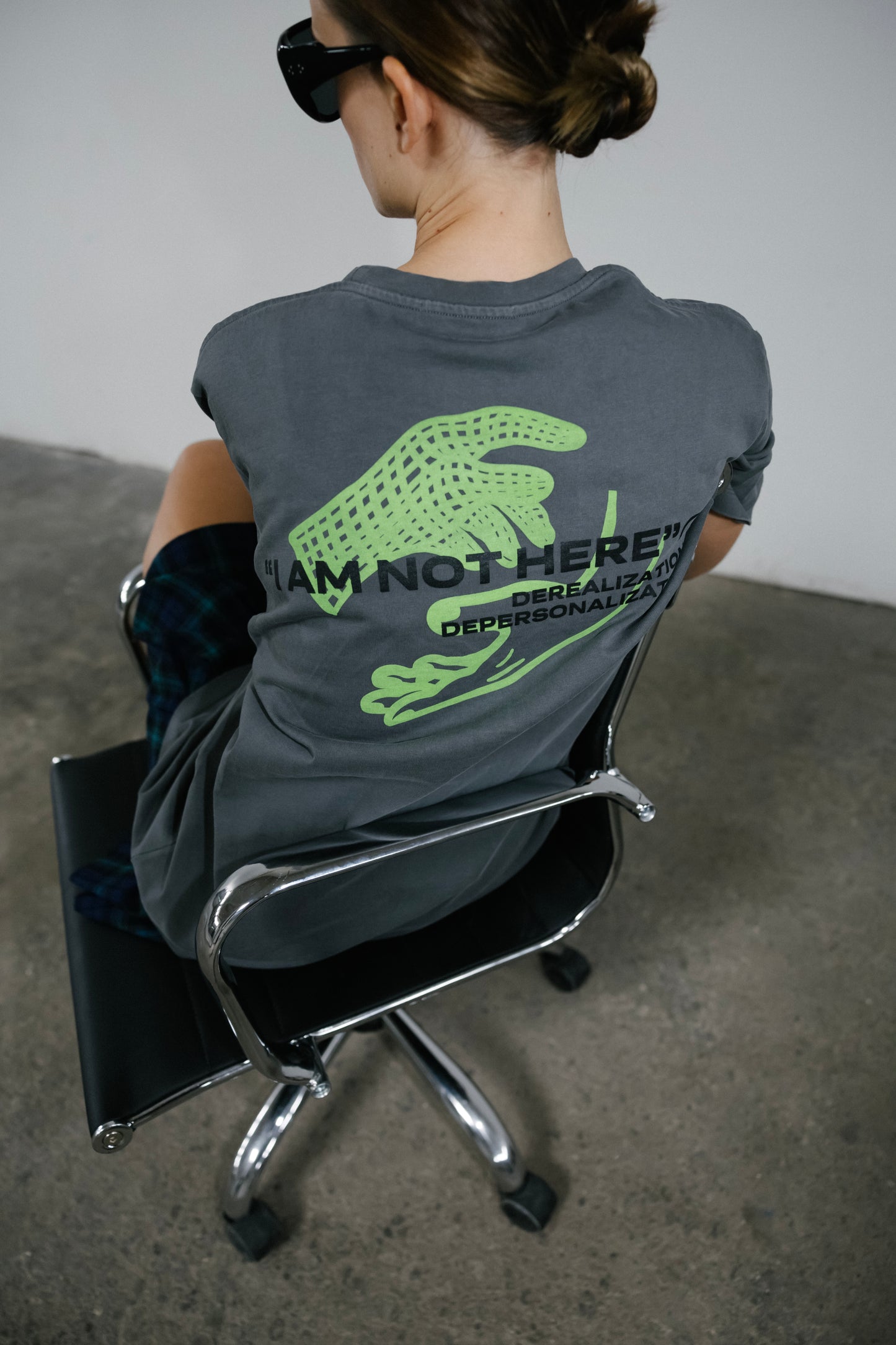A model wearing a 11:11 L.U.C.K. t-shirt