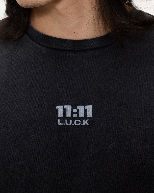 1111 luck logo on a black t-shirt